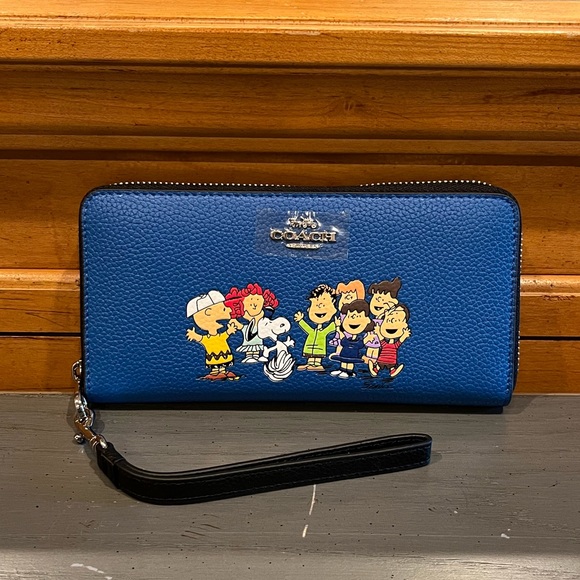 Coach Handbags - NWOT Coach X Peanuts Long Zip Around Wallet With Snoopy And Friends
